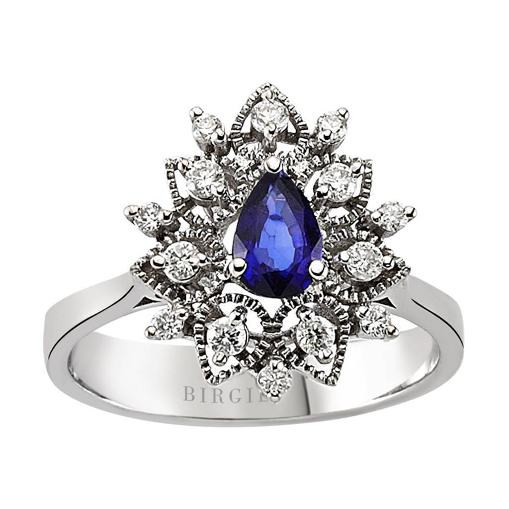 Diamond and teardrop sapphire ring