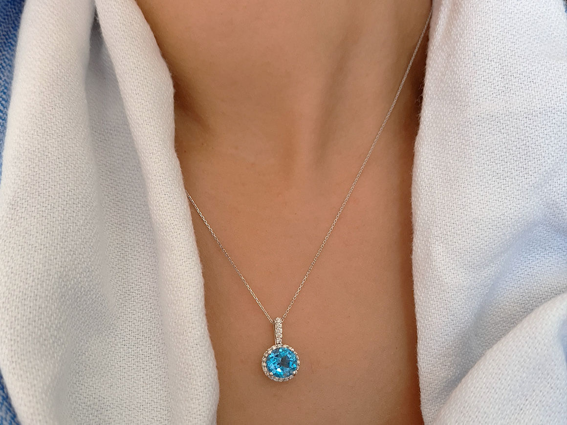 Collier diamant et topaze bleue
