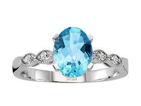 Diamond and Oval Blue Topaz Ring
