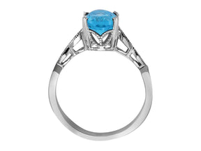 Diamond and Oval Blue Topaz Ring