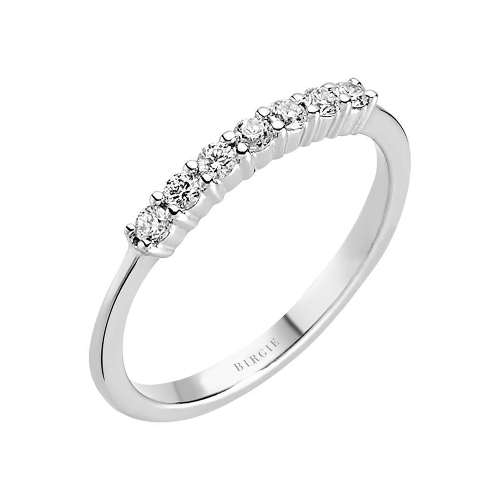 0.14 carat engagement ring with seven diamonds