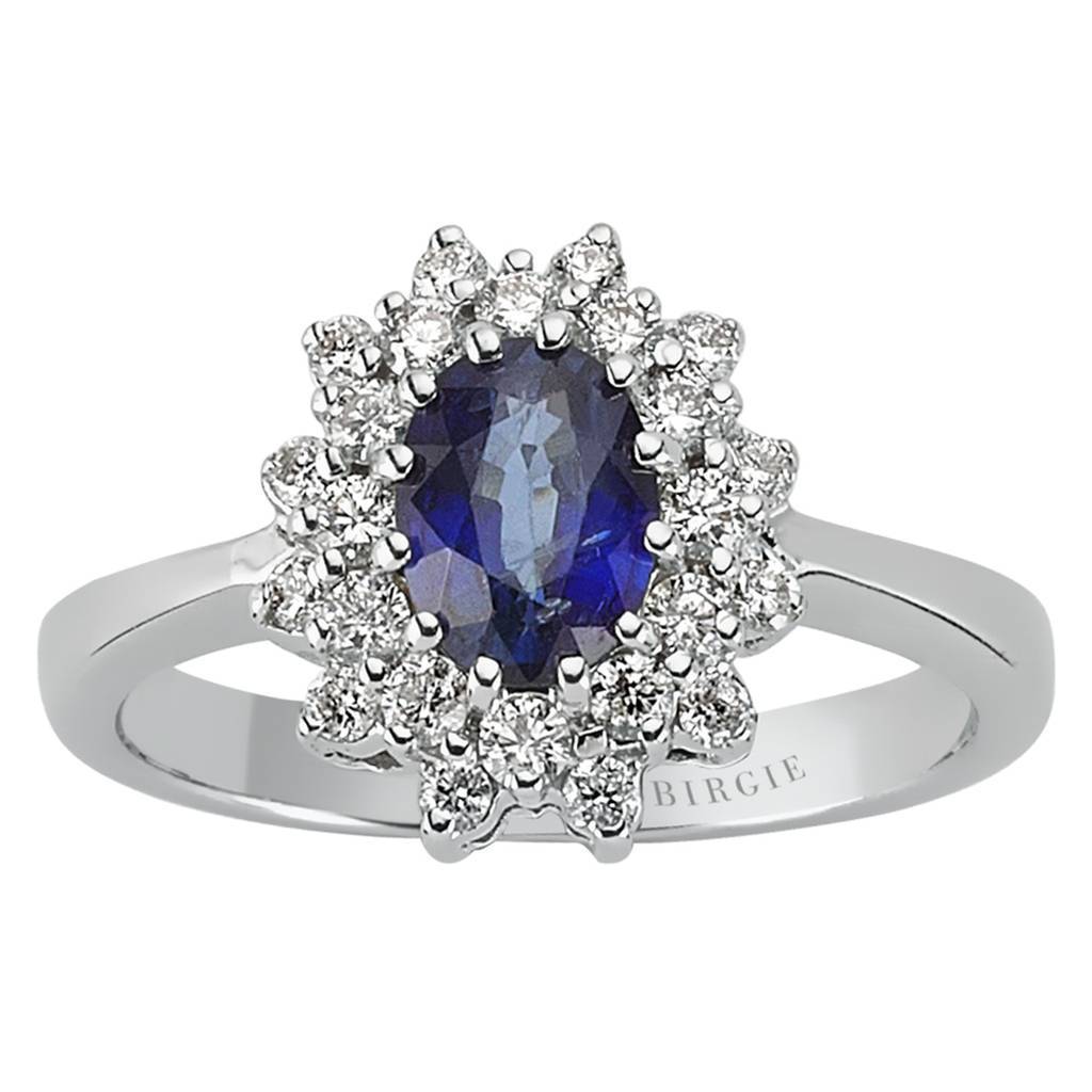 Bague à double grappe de diamants et saphir bleu taille ovale