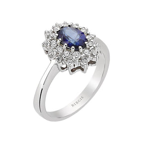 Bague à double grappe de diamants et saphir bleu taille ovale
