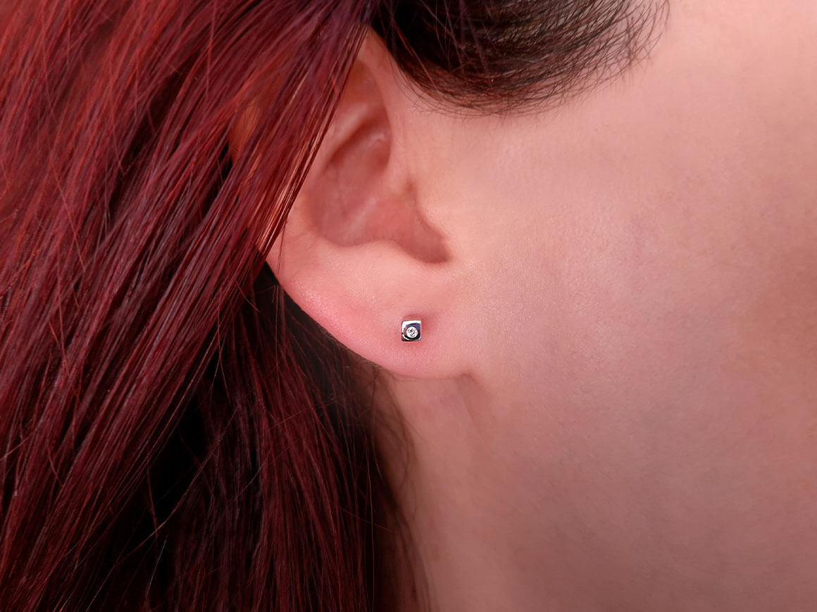 0.03 Carat Solitaire Diamond Earrings