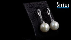 Diamond and pearl earrings