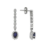Boucles d'oreilles élégantes en diamant et saphir ovale