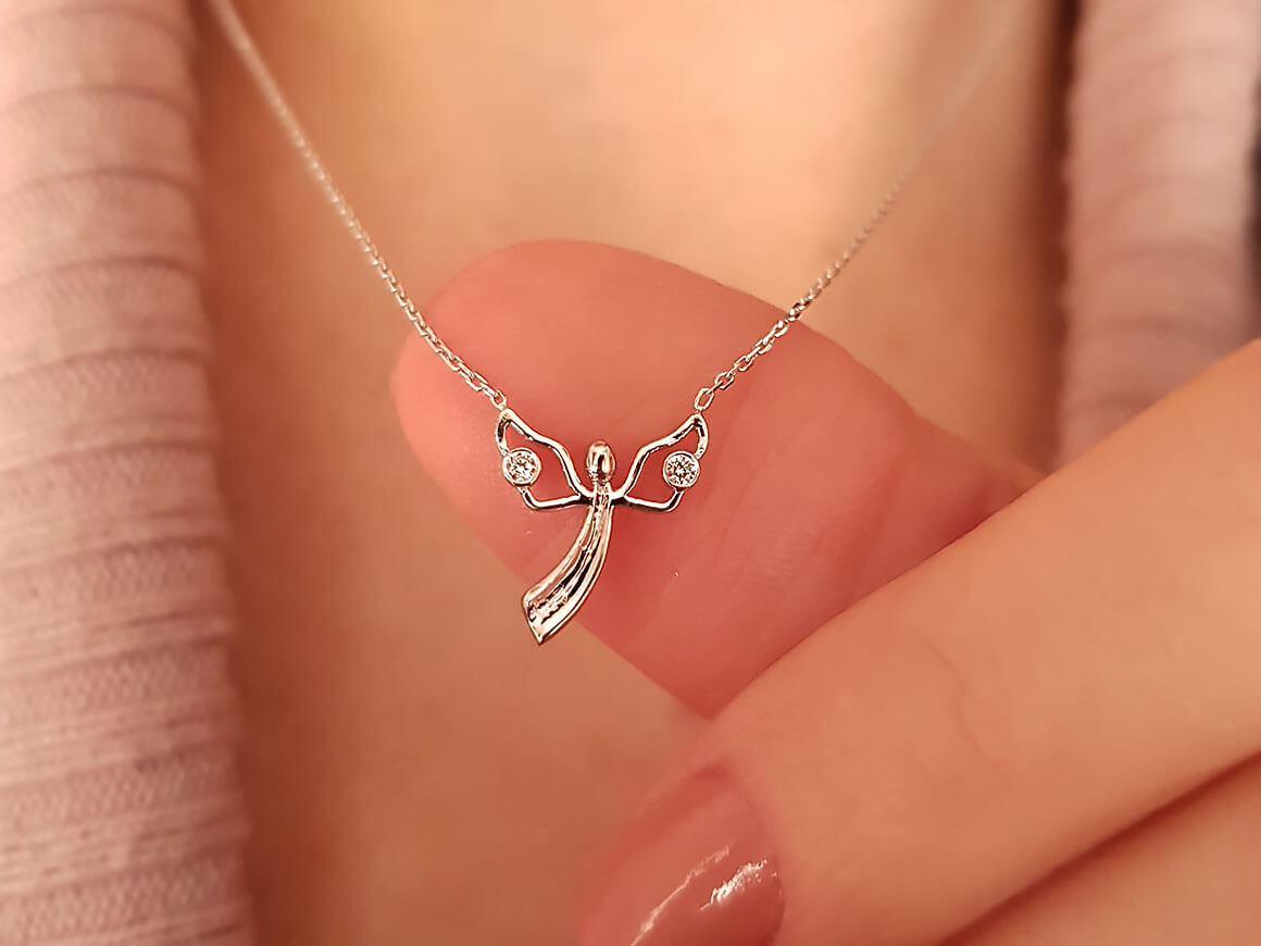 Collier ange diamant