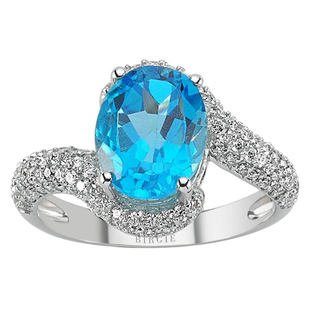 Bague diamant et topaze bleue ovale