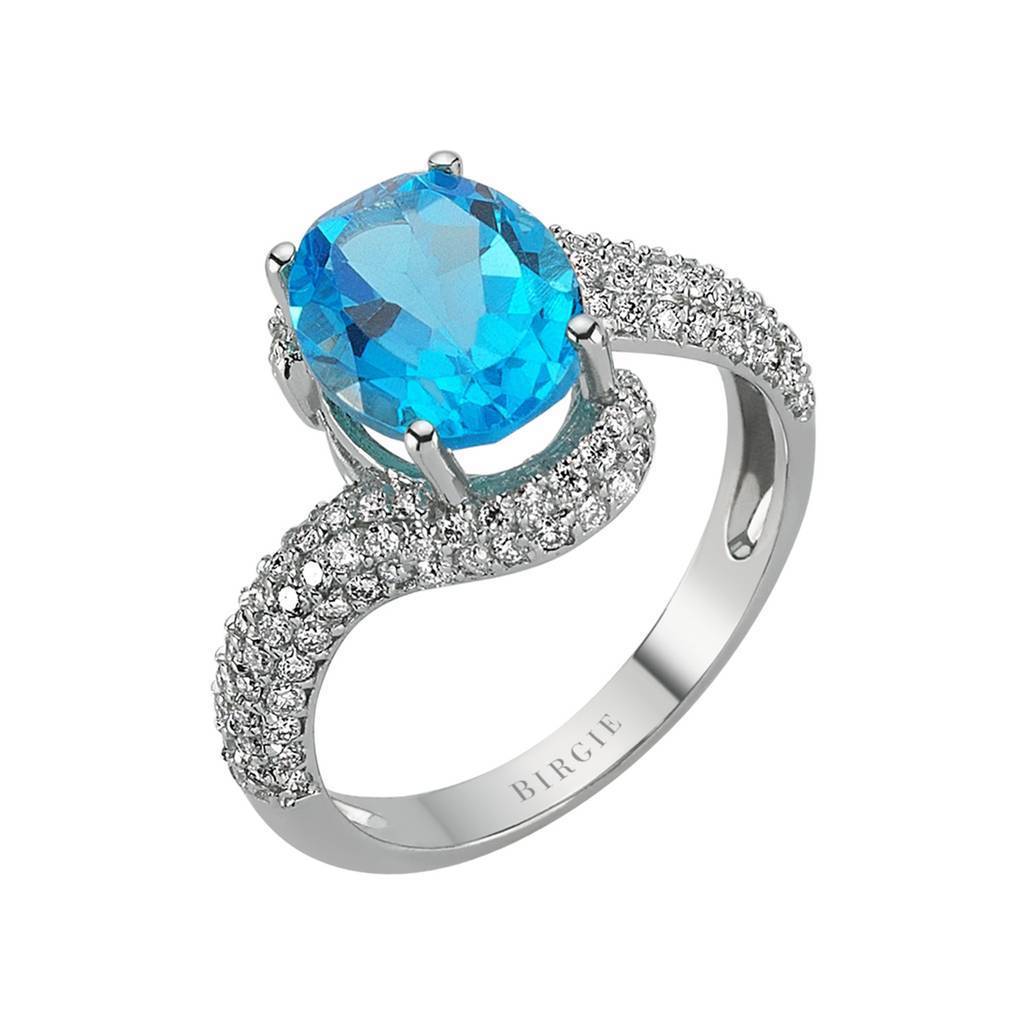 Bague diamant et topaze bleue ovale