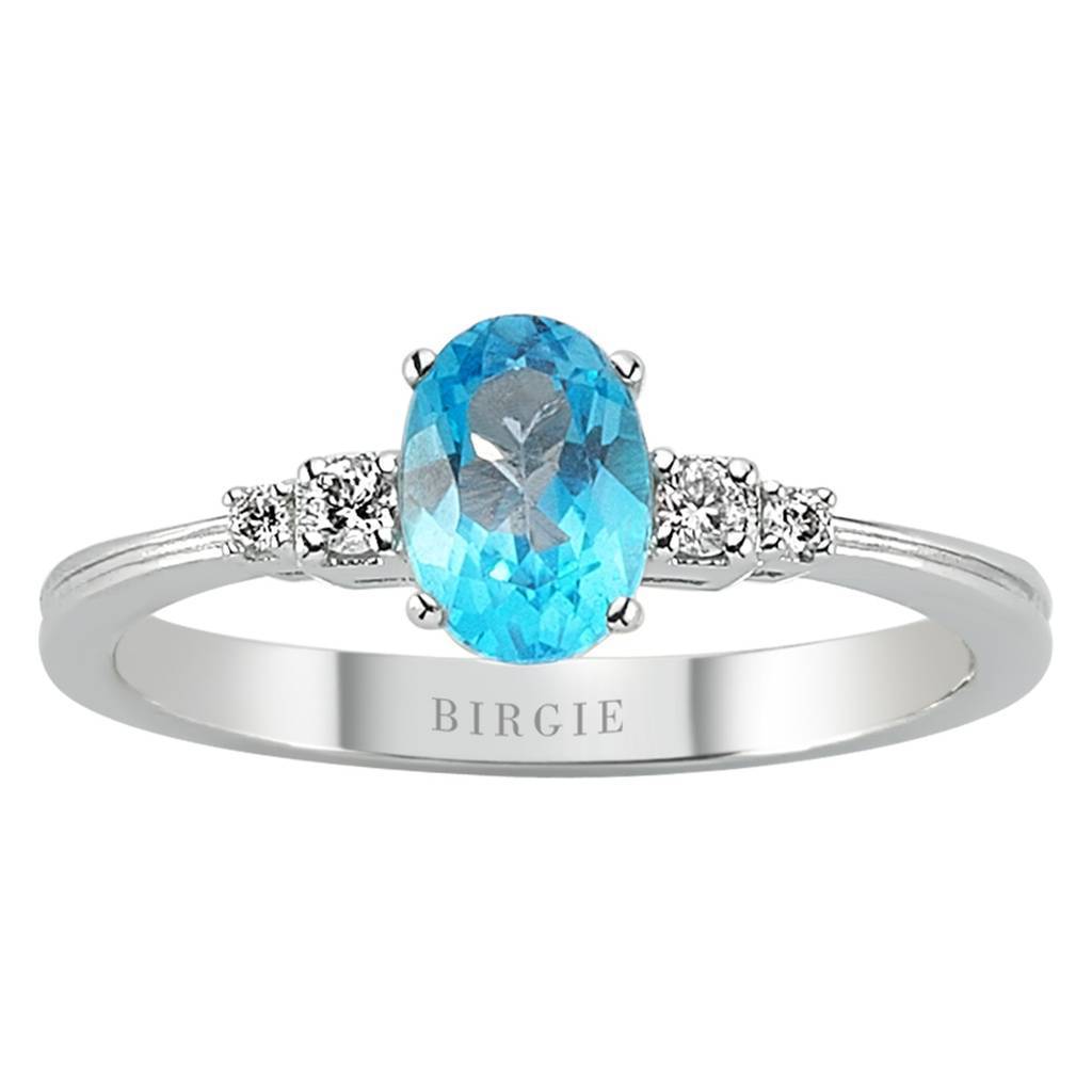 Bague diamant et topaze bleue ovale