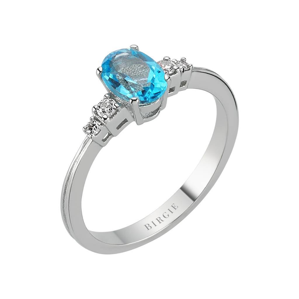 Bague diamant et topaze bleue ovale
