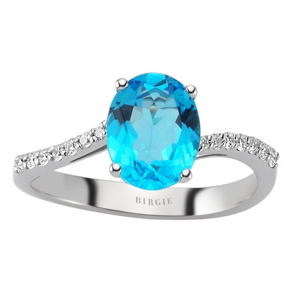 Bague diamant et topaze bleue taille ovale