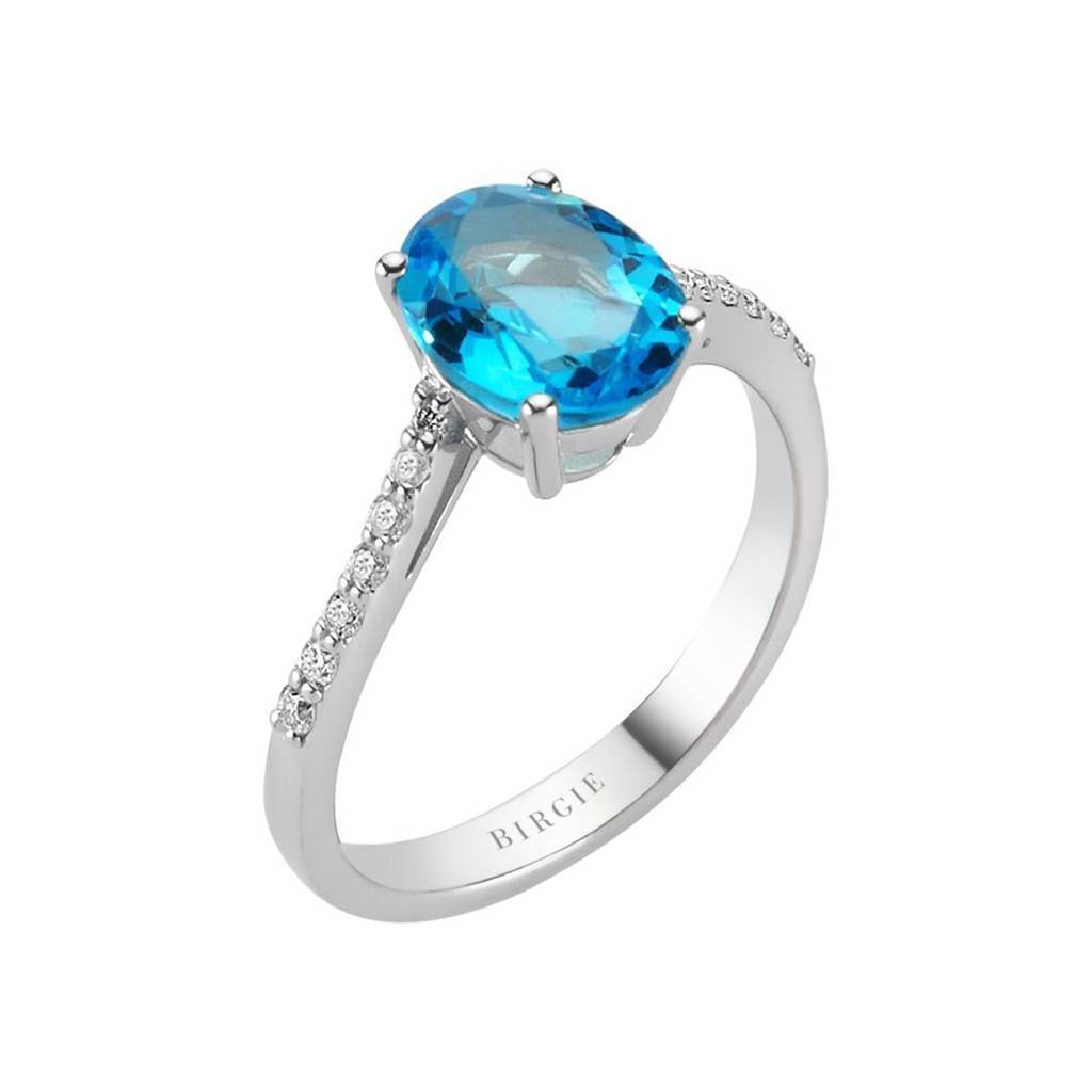Bague diamant et topaze bleue taille ovale