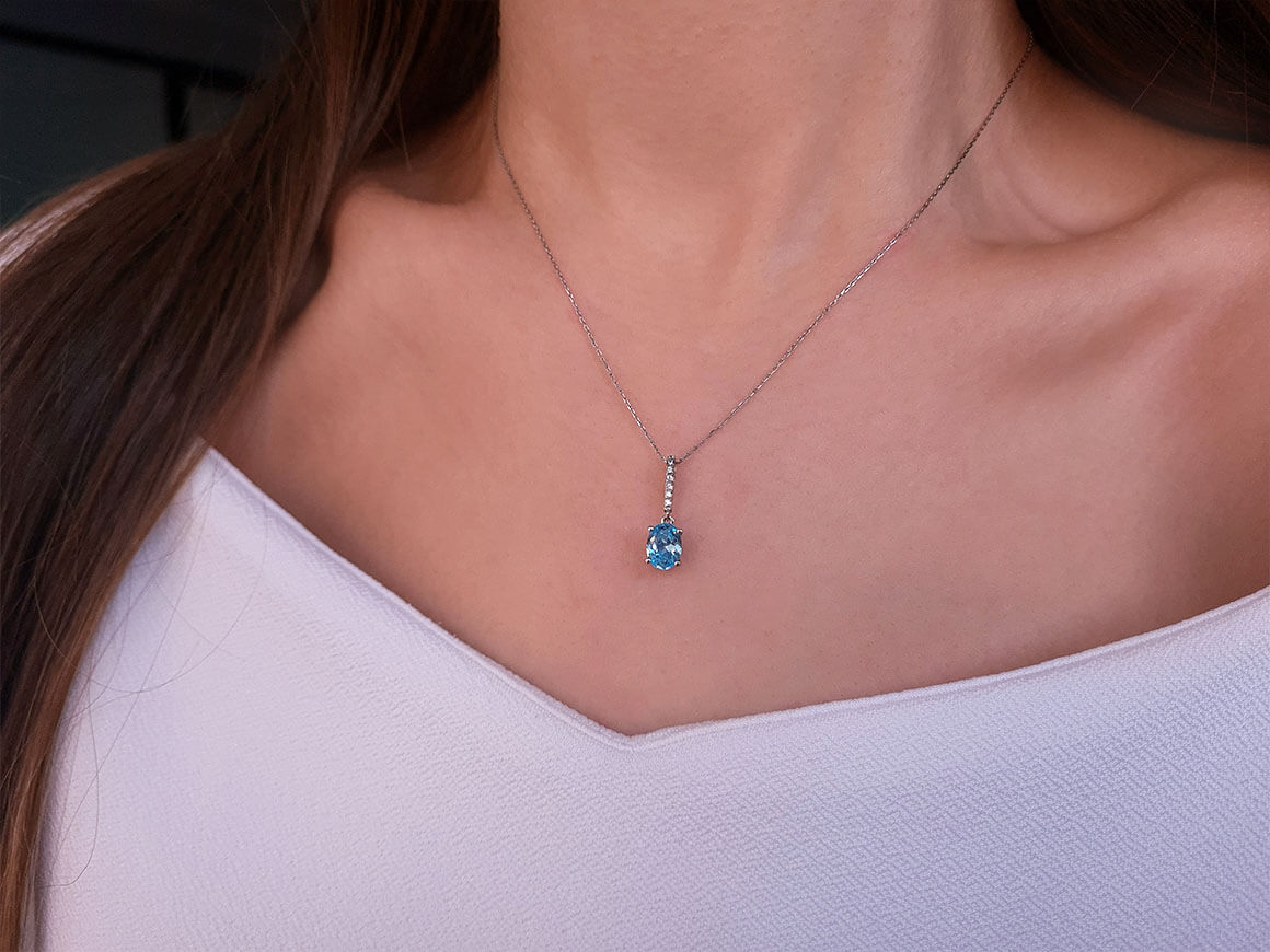 Diamond and Oval Blue Topaz Necklace