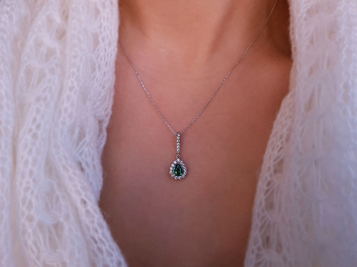 Diamond and drop emerald necklace