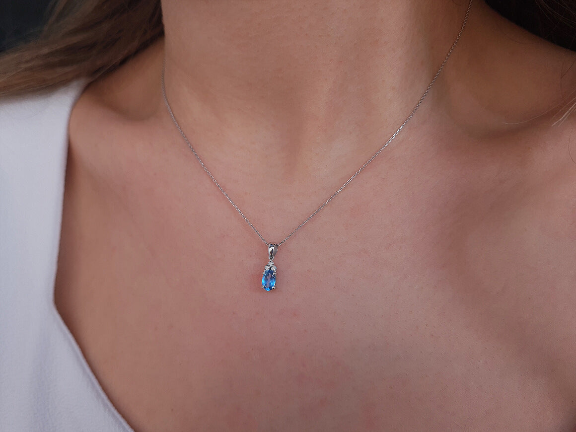 Diamond and Oval Blue Topaz Necklace