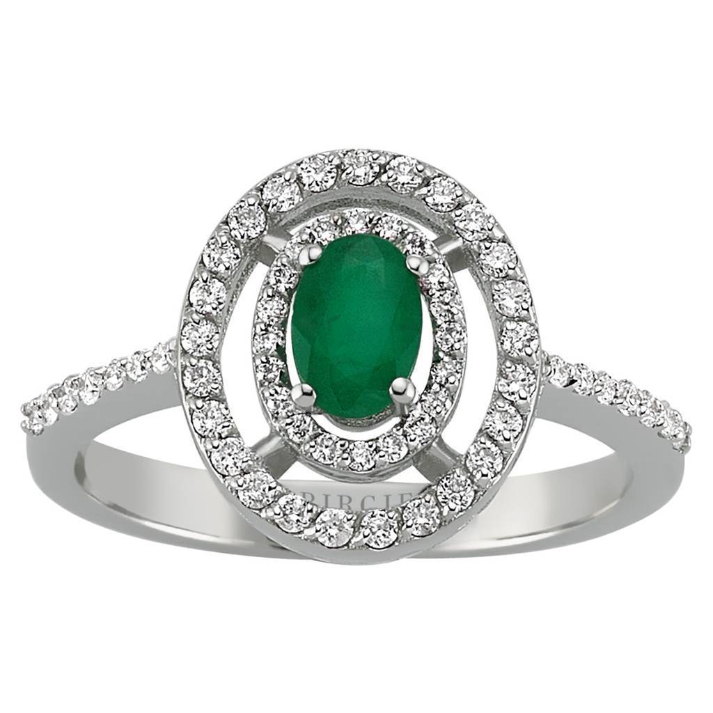 Bague diamant et pierre émeraude ovale