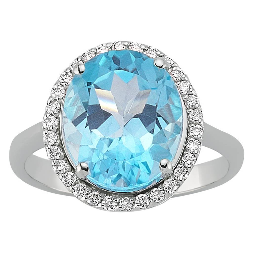Bague ovale avec topaze bleue et diamants