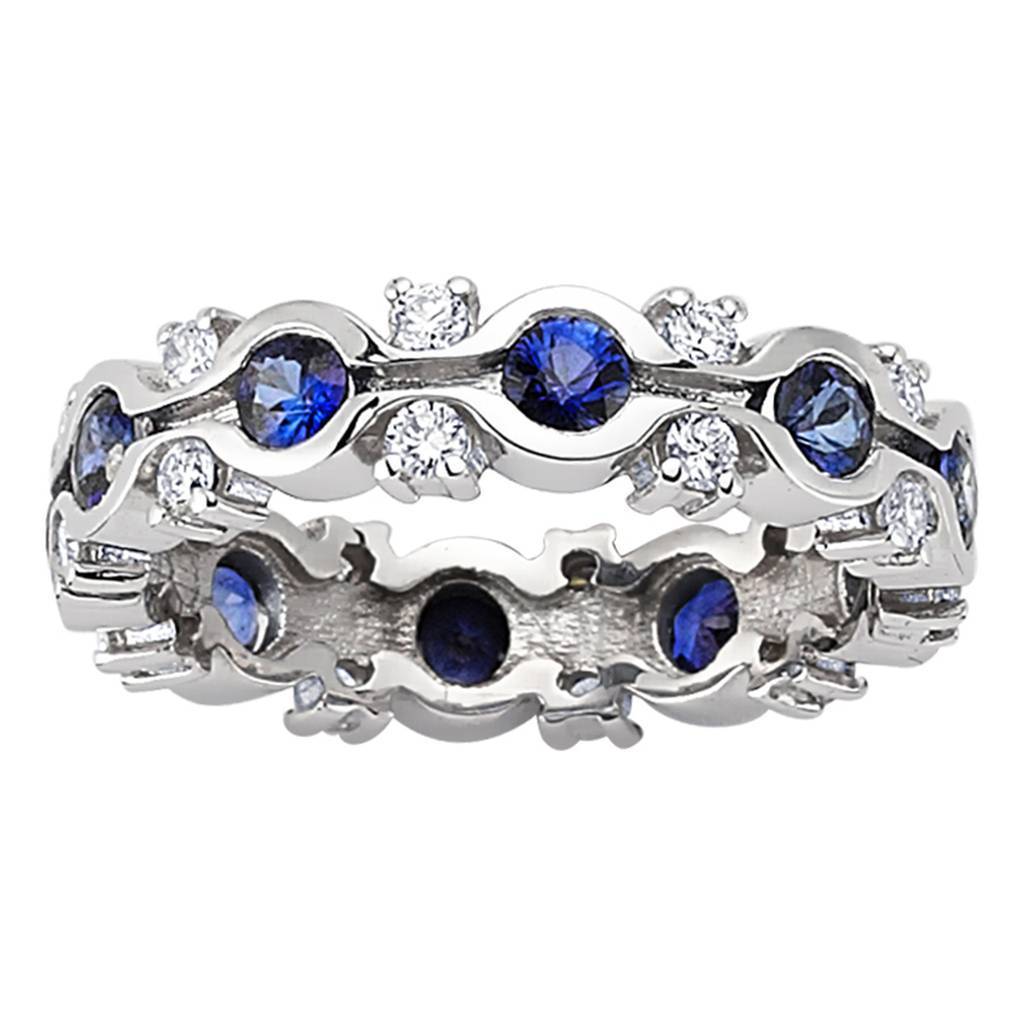 Bague éternité en saphir et diamants sertie demi-canal