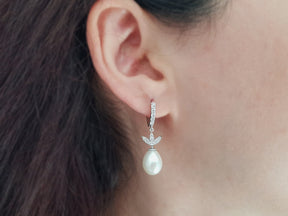 Diamond and drop pearl earrings
