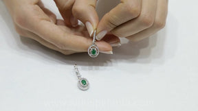 Boucles d'oreilles diamants et émeraudes ovales