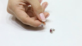 Boucles d'oreilles diamant et rubis ovale