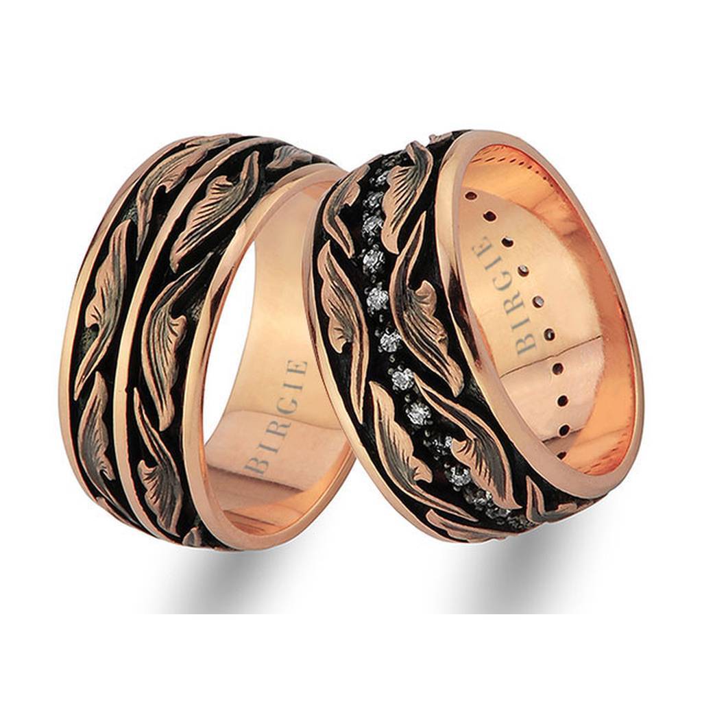 Alliance en or rose avec diamants motif feuille